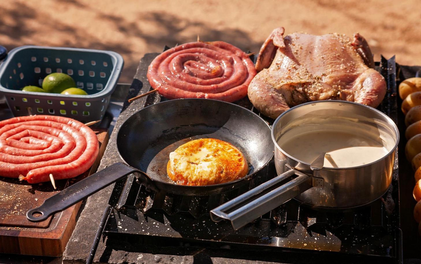 Workshop participants learning traditional ethnic cuisine preparation techniques