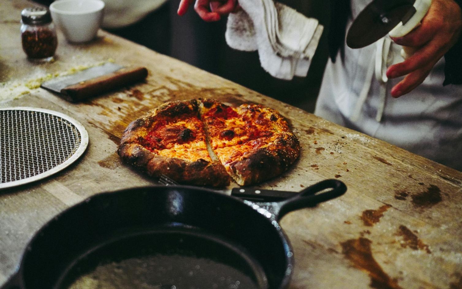 Hands preparing traditional ethnic cuisine ingredients