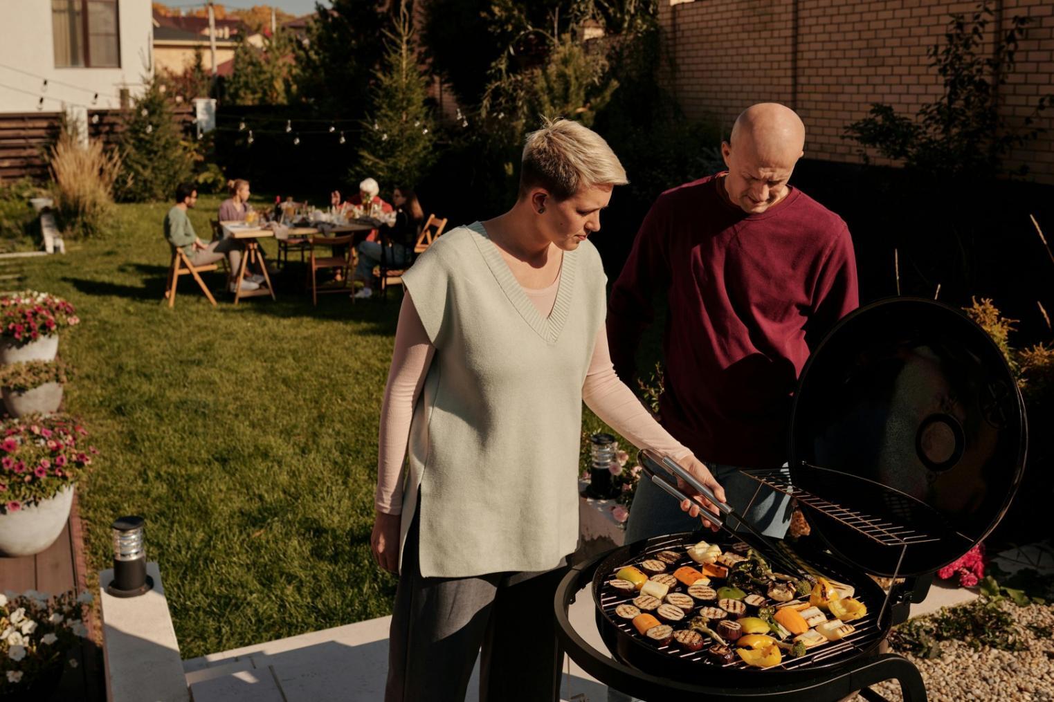 Students practicing hands-on cooking techniques